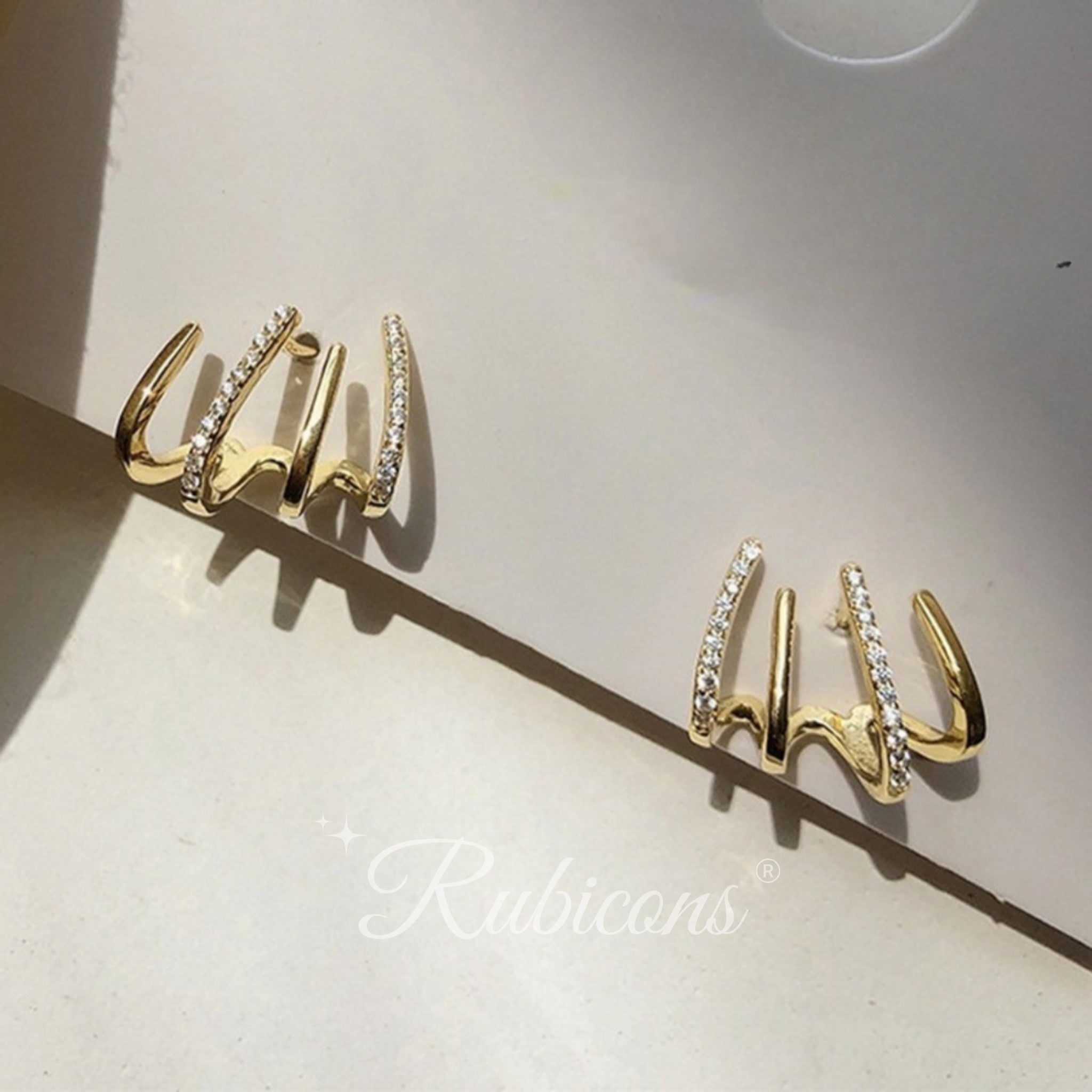 Gold Clawcrest Earrings